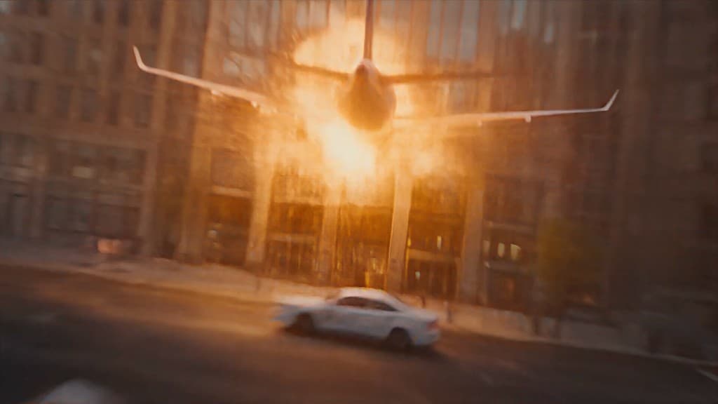 Aircraft racing through a city street against a burst of light